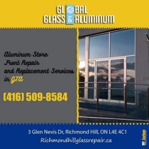 Storefront Installation Toronto, ON. Supply and installation a clear anodized curtain wall store front including double doors.